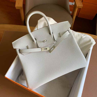 Herm25  New Product, Fully Hand-Sewn