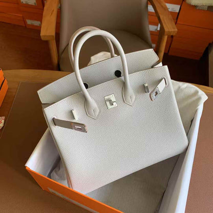 Herm25  New Product, Fully Hand-Sewn