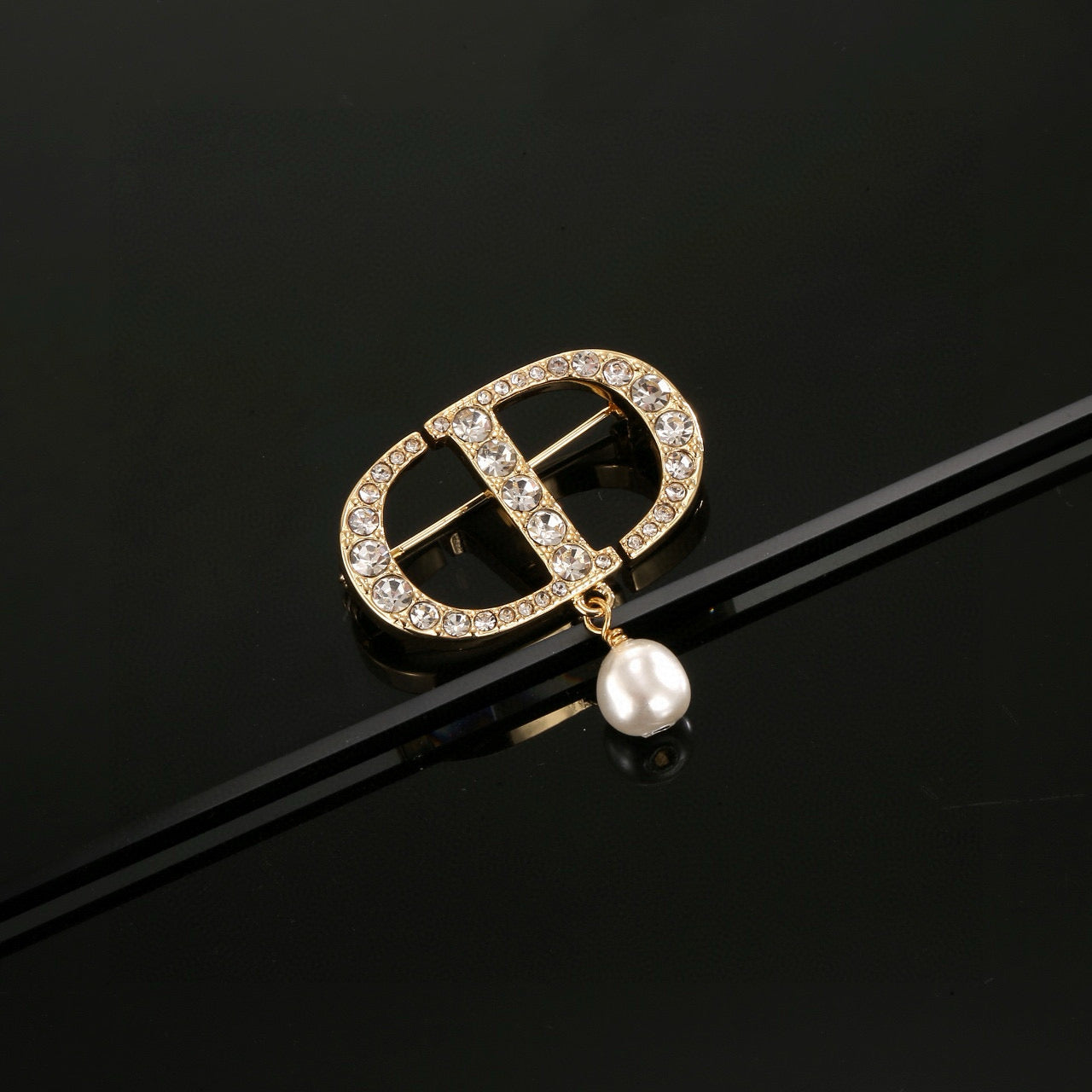 CD New Alphabet brooch