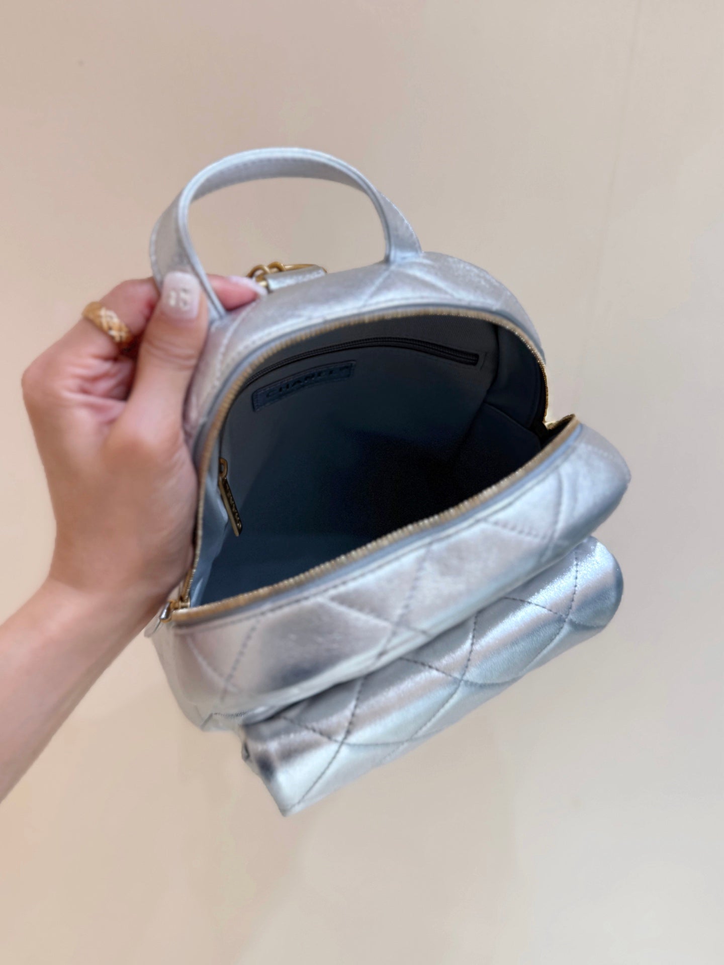 New CHAN silver backpack