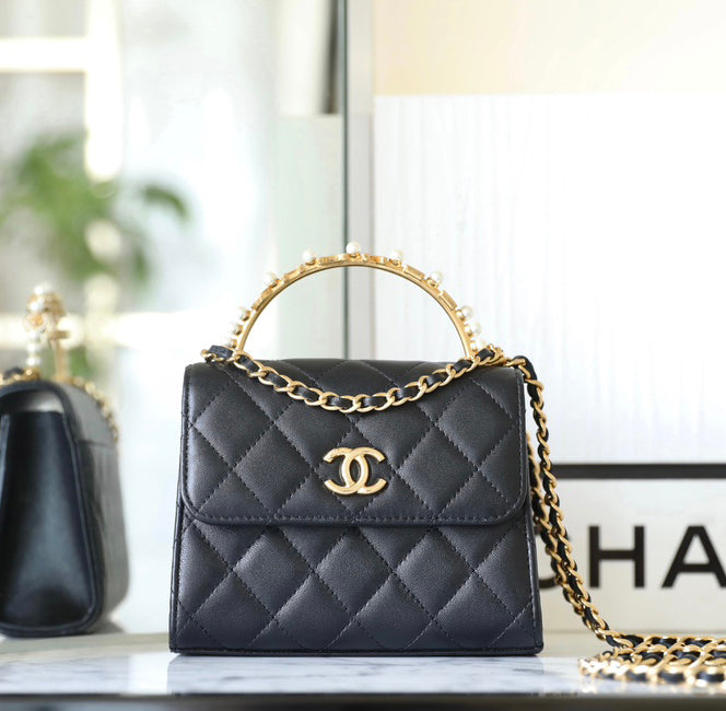 Chan New 23b mini kelly pearl handle bag