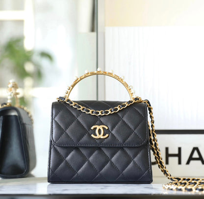 Chan New 23b mini kelly pearl handle bag
