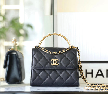 Chan New 23b mini kelly pearl handle bag