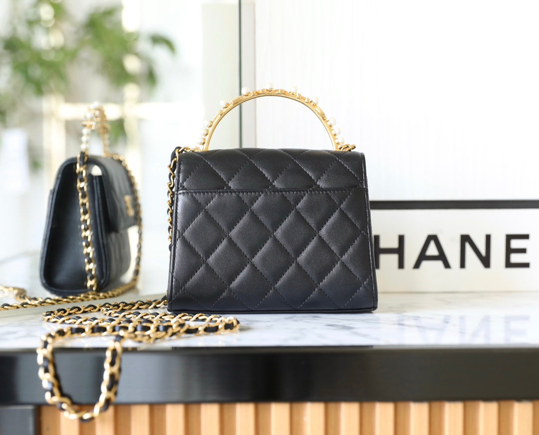 Chan New 23b mini kelly pearl handle bag