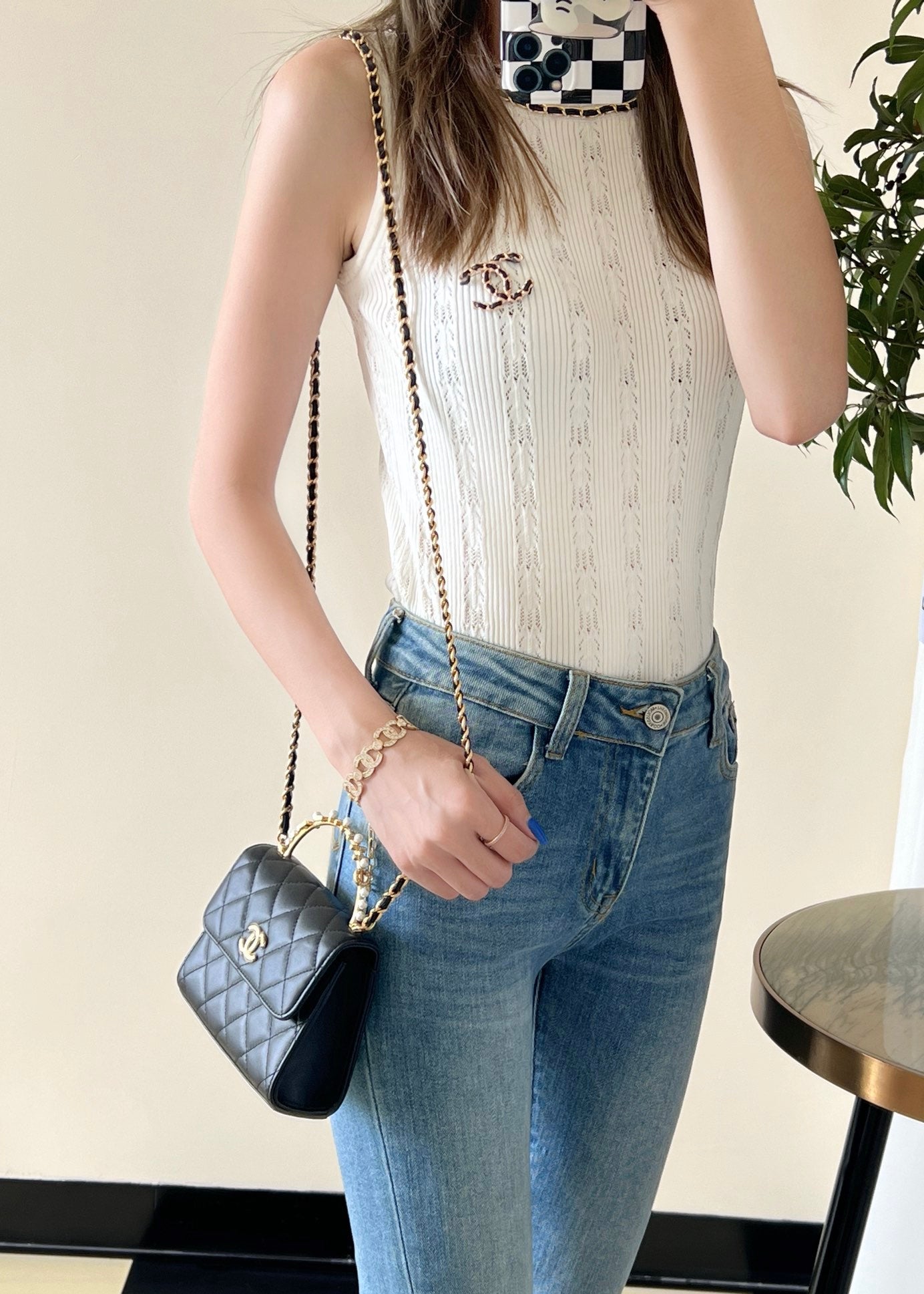 Chan New 23b mini kelly pearl handle bag