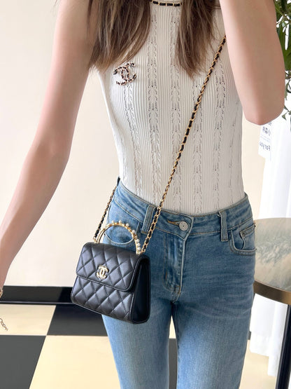 Chan New 23b mini kelly pearl handle bag