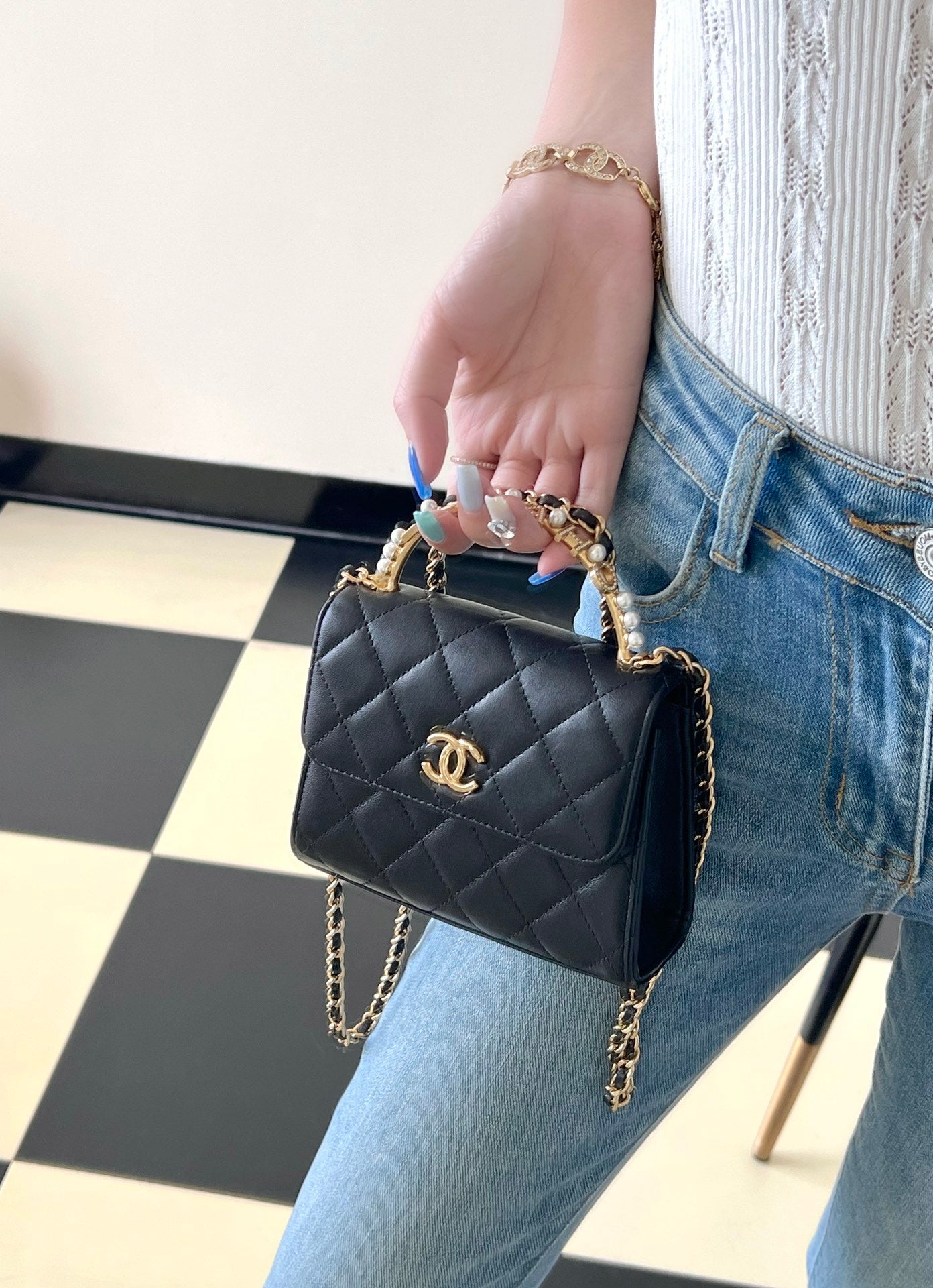 Chan New 23b mini kelly pearl handle bag
