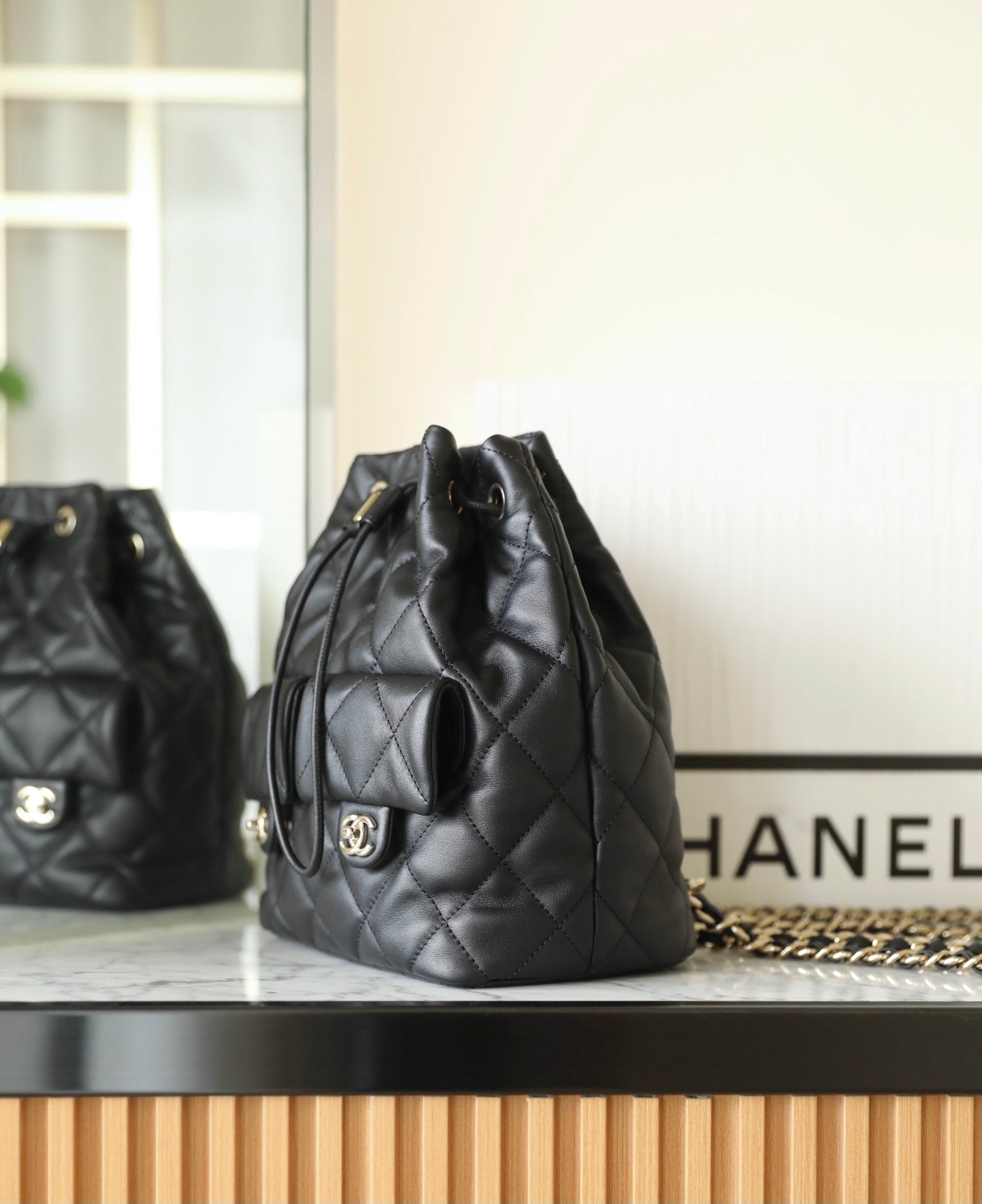 Chan New 23b Drawstring bucket backpack