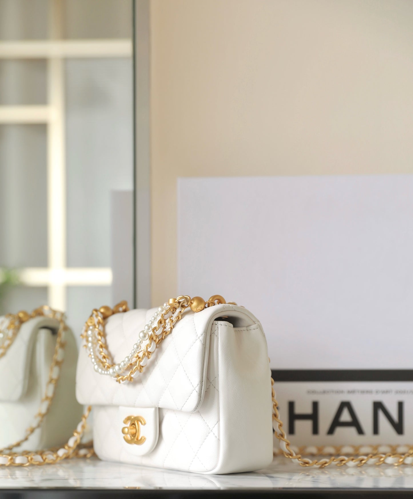 Chan New 24p Pearl chain flap bag